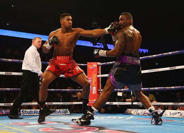 LONDON, ENGLAND - DECEMBER 12: Anthony Joshua and Dillian Whyte in action during the British and Commonwealth heavyweight title contest at The O2 Arena on December 12, 2015 in London, England. (Photo by Richard Heathcote/Getty Images)