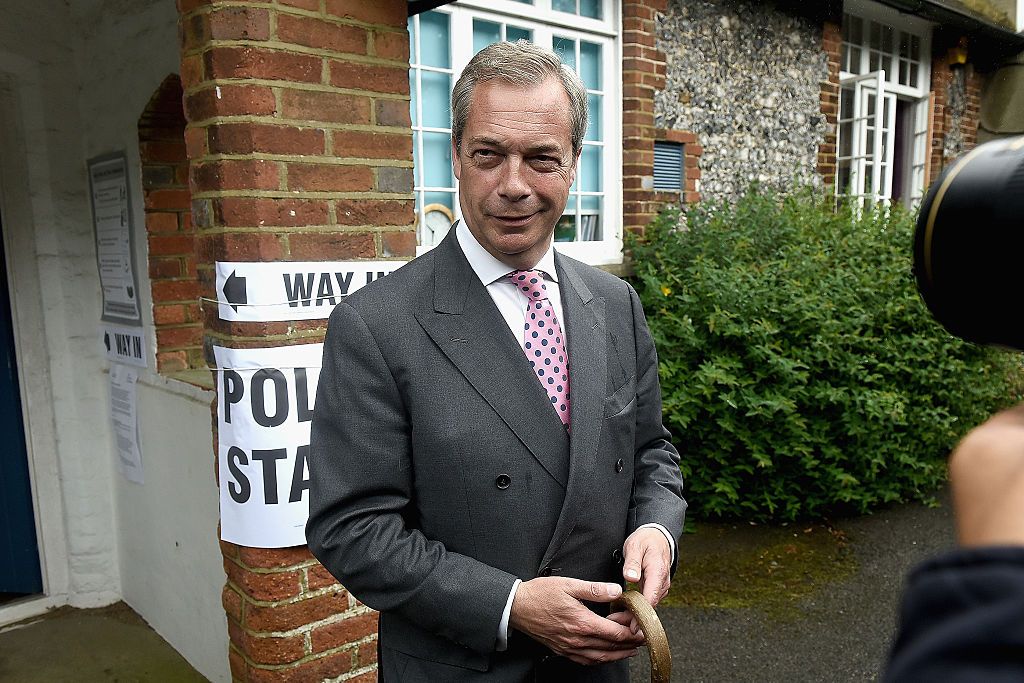 WESTERHAM, UNITED KINGDOM - JUNE 23: Nigel Farage, leader of UKIP and Vote Leave campaigner, talks to the media after registering his vote in the UK's EU referendum, at his local polling station Cudham Church of England Primary School on June 23, 2016 in Westerham, England. The United Kingdom has gone to the polls to decide whether or not the country wishes to remain within the European Union. After a hard fought campaign from both REMAIN and LEAVE the vote is too close to call. A result on the referendum is expected on Friday morning. (Photo by Mary Turner/Getty Images)