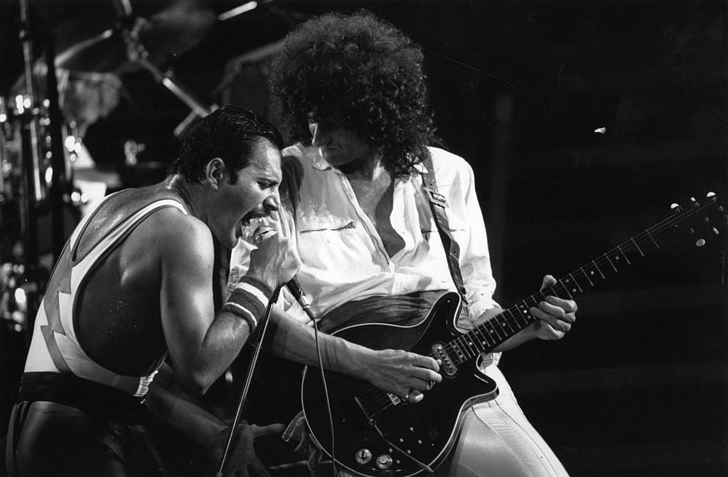 3rd September 1984: British rock group Queen in concert with singer Freddie Mercury (Frederick Bulsara, 1946 - 1991) and guitarist Brian May. (Photo by Rogers/Express/Getty Images)