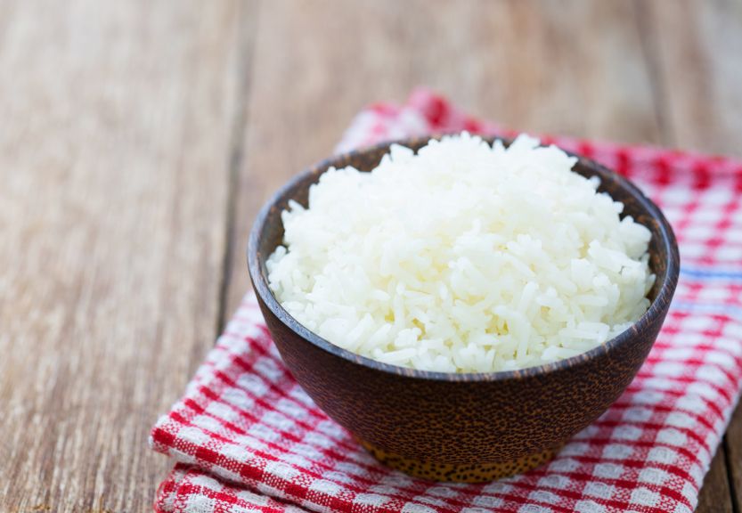 Jasmine rice in a rice bowl on wood table