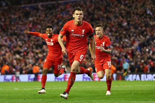 LIVERPOOL, ENGLAND - APRIL 14: Dejan Lovren of Liverpool celebrates scoring his team's fourth goal during the UEFA Europa League quarter final, second leg match between Liverpool and Borussia Dortmund at Anfield on April 14, 2016 in Liverpool, United Kingdom. (Photo by Clive Brunskill/Getty Images)