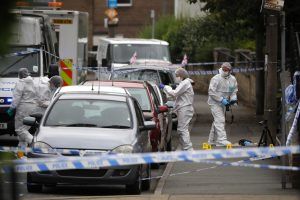 BIRSTALL, ENGLAND - JUNE 16: Forensic police examine the crime scene after Jo Cox, 41, Labour MP for Batley and Spen, was shot and stabbed by an attacker at her constituicency on June 16, 2016 in Birstall, England. A man also suffered slight injuries during the attack. Jo Cox has died after being shot and repeatedly stabbed while holding her weekly surgery at Birstall Library, Birstall near Leeds. A 53-year old man has been arrested in connection with the crime. (Photo by Christopher Furlong/Getty Images)