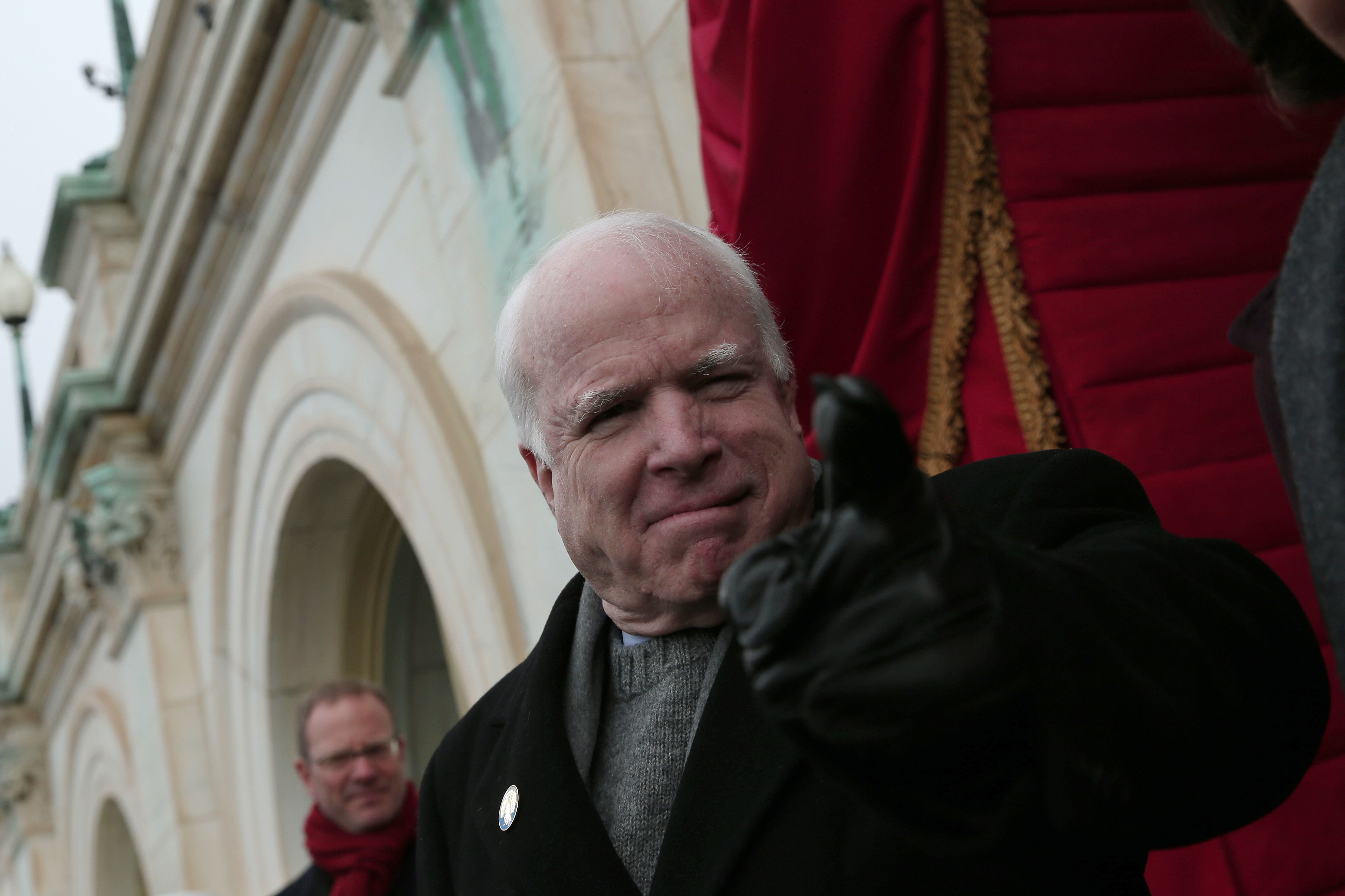 WASHINGTON, DC - JANUARY 21: U.S. Senator John McCain (R-AZ) gestures to U.S. Rep. Peter King before the presidential inauguration on the West Front of the U.S. Capitol January 21, 2013 in Washington, DC. Barack Obama was re-elected for a second term as President of the United States. (Photo by Win McNamee/Getty Images)