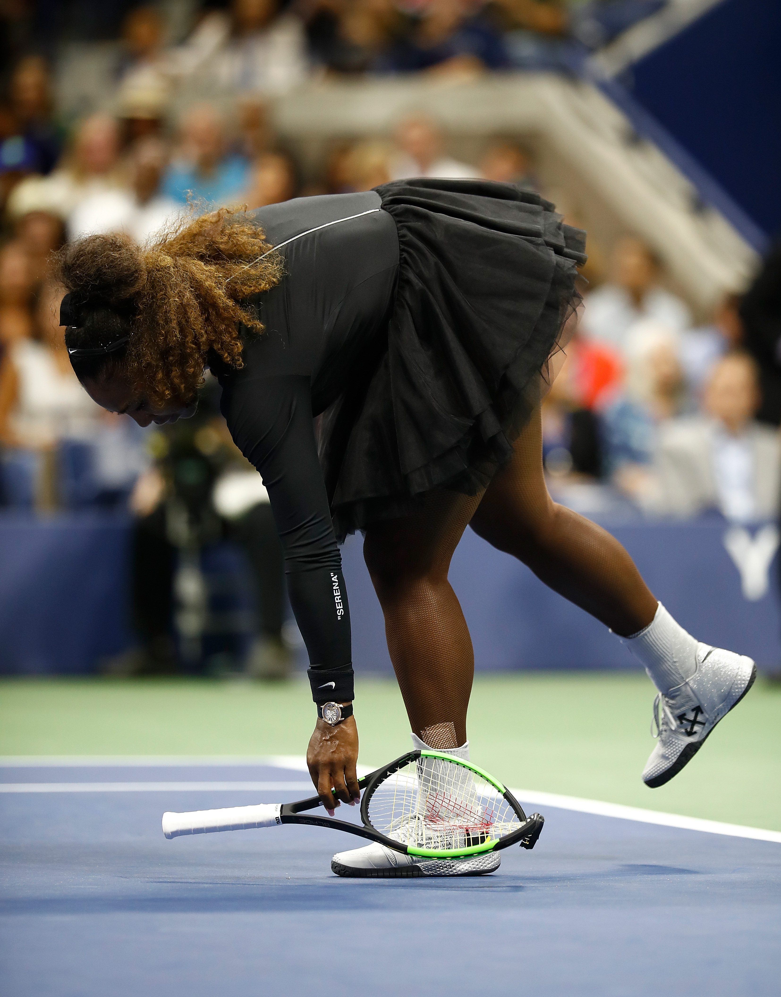 NEW YORK, NY - SEPTEMBER 08: Serena Williams of the United States throws her racket to the ground in frustration in the Women's Singles finals match against Naomi Osaka of Japan on Day Thirteen of the 2018 US Open at the USTA Billie Jean King National Tennis Center on September 8, 2018 in the Flushing neighborhood of the Queens borough of New York City. (Photo by Julian Finney/Getty Images)