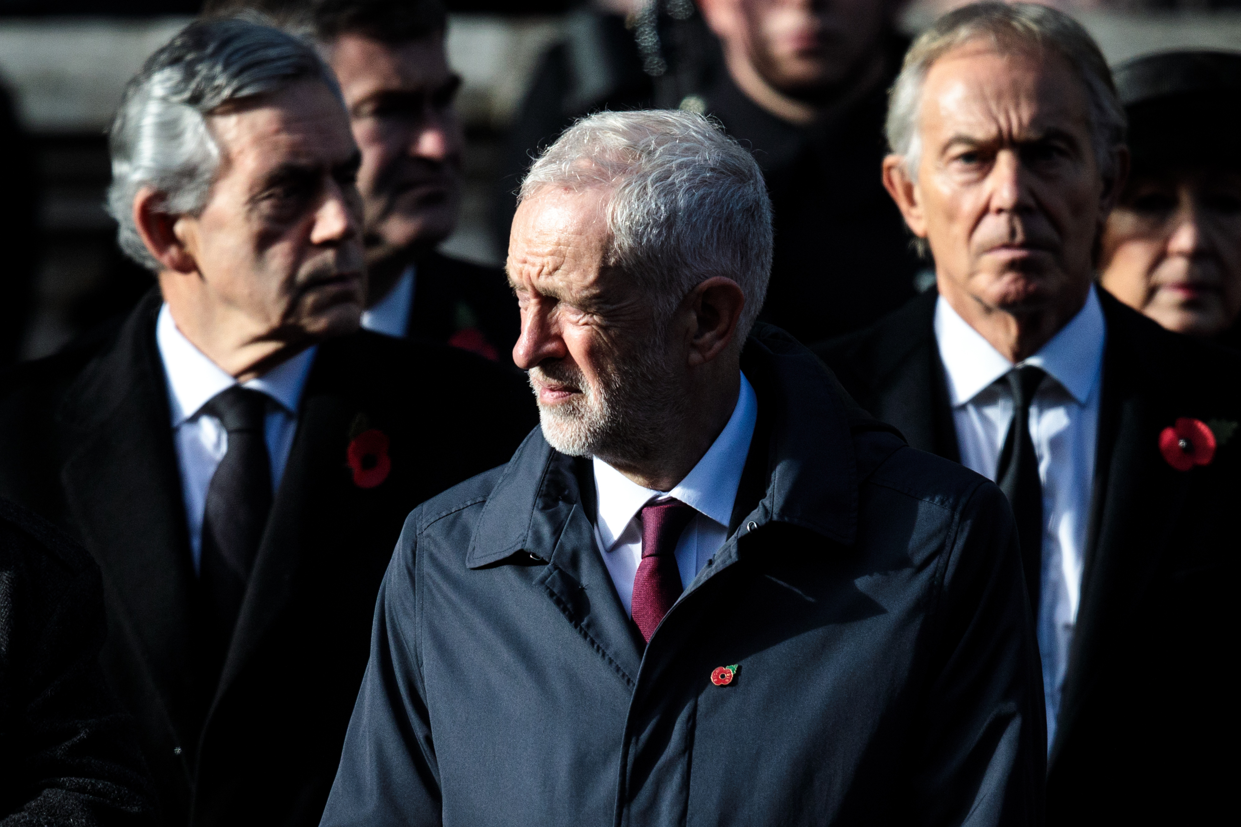 LONDON, ENGLAND - NOVEMBER 11: Former Prime Ministers Gordon Brown (L) and Tony Blair (R) stand behind Labour Leader Jeremy Corbyn (C) during the annual Remembrance Sunday memorial at the Cenotaph on Whitehall on November 11, 2018 in London, England. The armistice ending the First World War between the Allies and Germany was signed at Compiègne, France on eleventh hour of the eleventh day of the eleventh month - 11am on the 11th November 1918. This day is commemorated as Remembrance Day with special attention being paid for this year’s centenary. (Photo by Jack Taylor/Getty Images)