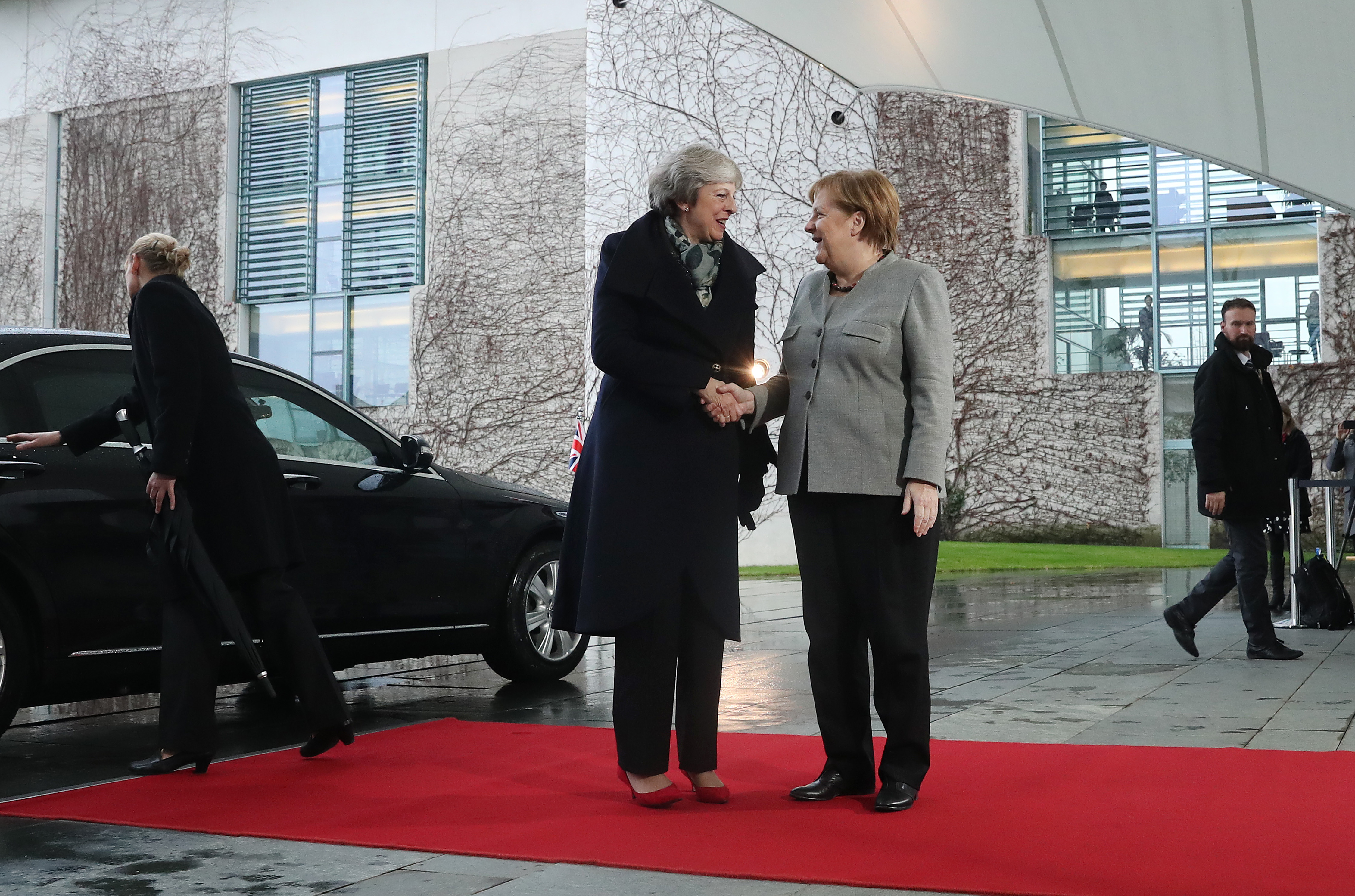 BERLIN, GERMANY - DECEMBER 11: German Chancellor Angela Merkel greets British Prime Minister Theresa May upon May's arrival for talks at the Chancellery on December 11, 2018 in Berlin, Germany. May is meeting Merkel ahead of Thursday's EU Council meeting in Brussels and following May's recent postponement of a vote over her Brexit plan in the British Parliament. May postponed the vote when it became clear she would lose. She is now seeking to wring out extra concessions from EU leaders in order to gain the necessary votes she still needs. (Photo by Sean Gallup/Getty Images)