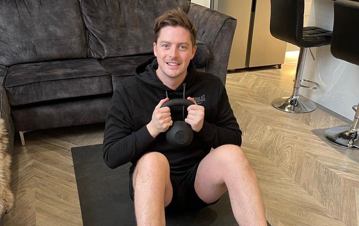 A&E doctor ALex George works out at home as part of the #LiftWeightDonate campaign