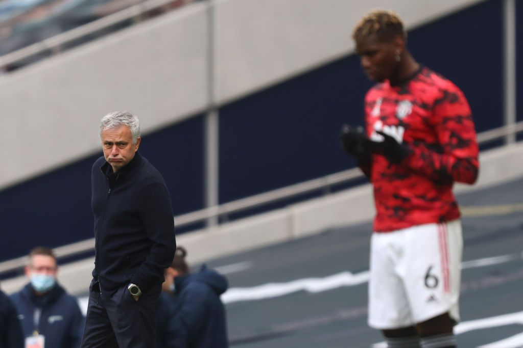 Mourinho looks at ex-player Pogba during Spurs United match