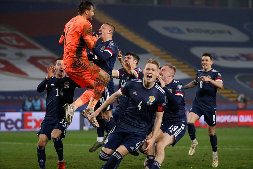David Marshall celebrates with teammates after Scotland penalty win