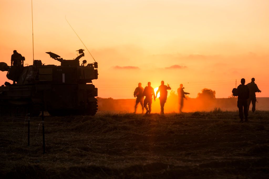 IDF troops gather at the border near Gaza