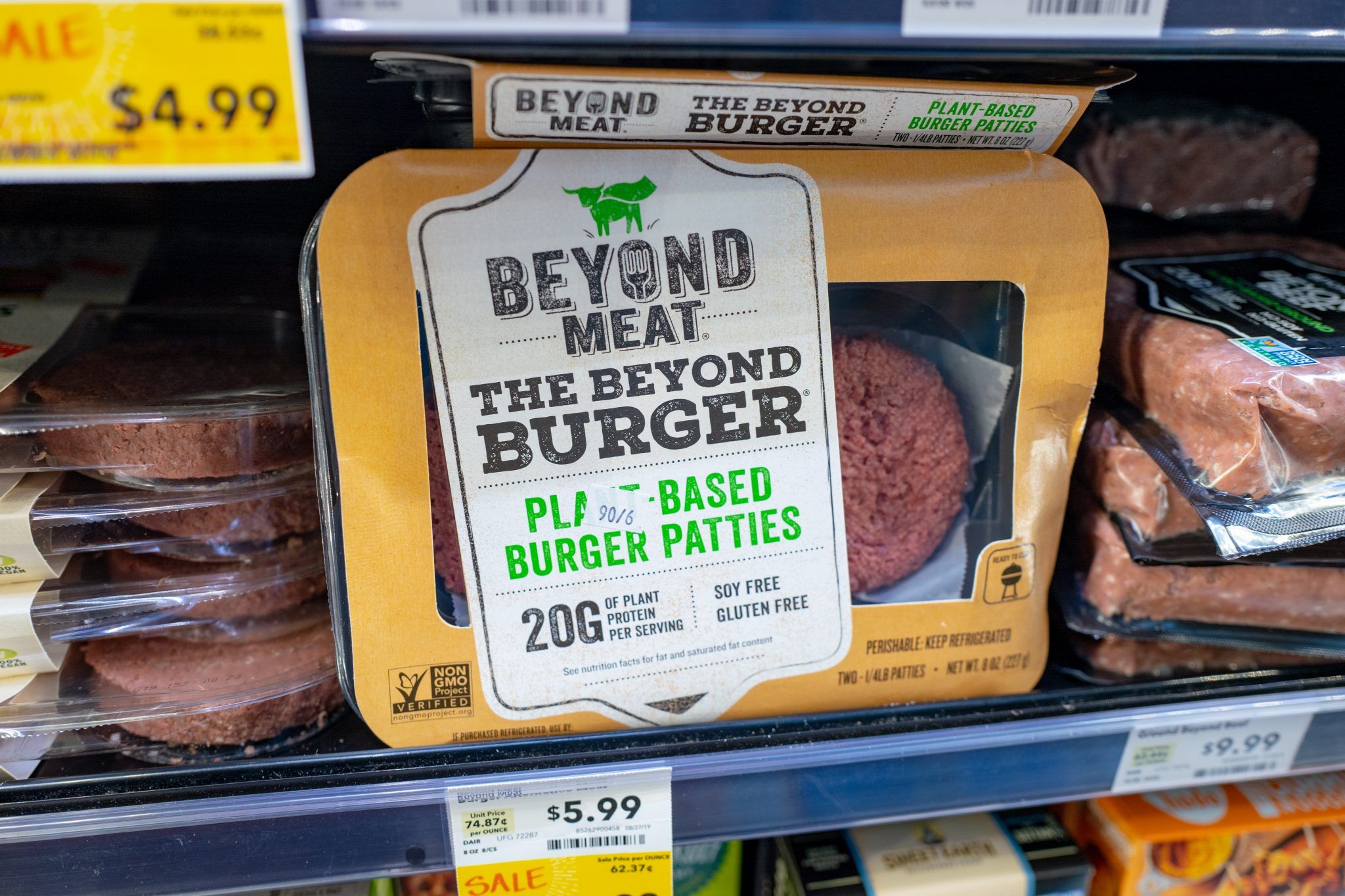 Engineered plant-based burger patties from food company Beyond Meat are visible on shelves among other meat alternatives at a grocery store in San Ramon, California, August 28, 2019. (Photo by Smith Collection/Gado/Getty Images)