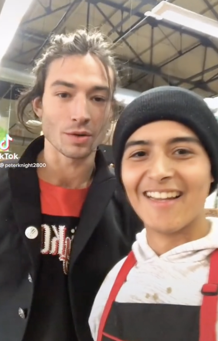 Ezra Miller and the store worker he offered to "knock out" (Credit:: TikTok @peterknight2800)