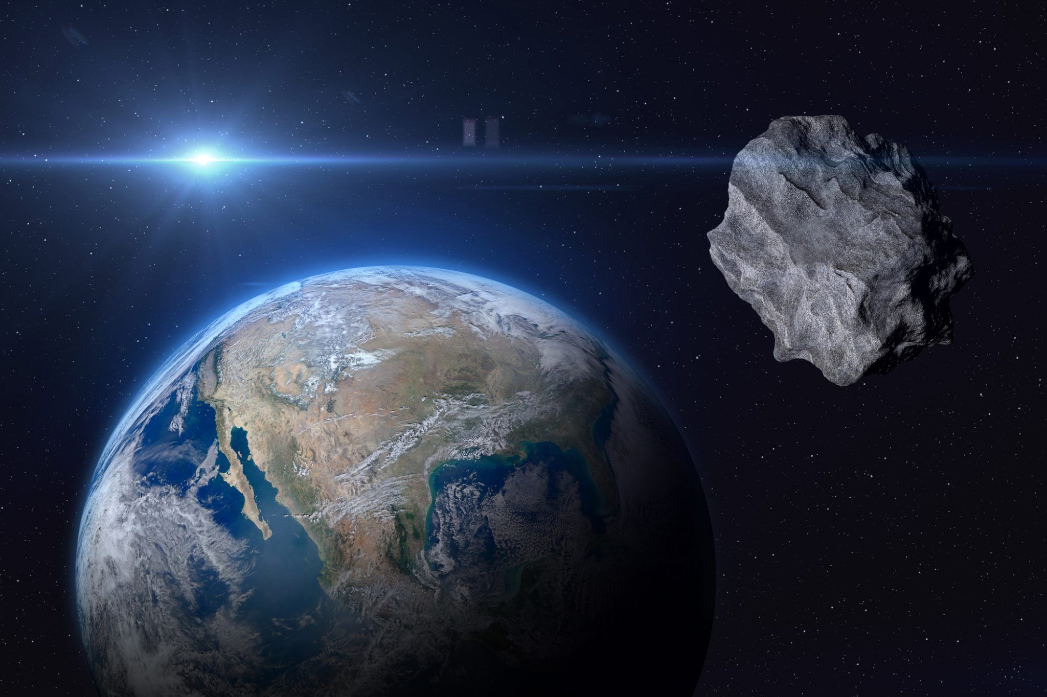 Planet Earth and big asteroid in the space. Concept a potentially hazardous object (PHO). Potentially hazardous asteroids (PHAs). Asteroid in outer space near Earth planet. Stony-iron meteorite is solar system. Elements of this image furnished by NASA. ______ Url(s): "https://www.nasa.gov/multimedia/imagegallery/image_feature_2159.html" Software: Adobe Photoshop CC 2015. Knoll light factory. Adobe After Effects CC 2017. 3ds Max 2016.